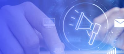 Hands behind a transparent icon of a bullhorn